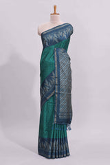 Green motifs art tussar saree with contrast leaf design border and striped blouse