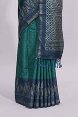 Green motifs art tussar saree with contrast leaf design border and striped blouse