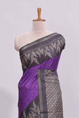 Violet motifs art tussar saree with contrast leaf design border and striped blouse