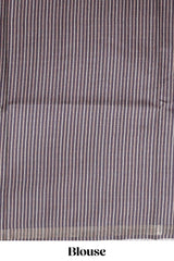 Violet motifs art tussar saree with contrast leaf design border and striped blouse