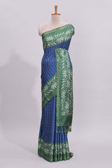 Blue geometric motifs design art tussar saree with contrast floral design border and printed blouse