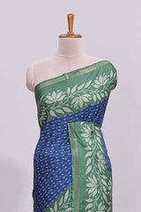 Blue geometric motifs design art tussar saree with contrast floral design border and printed blouse