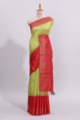 Green plain design art tussar saree with contrast striped border and blouse