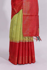 Green plain design art tussar saree with contrast striped border and blouse
