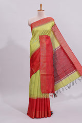 Green plain design art tussar saree with contrast striped border and blouse