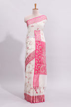 White floral design art tussar saree with contrast border and zari blouse