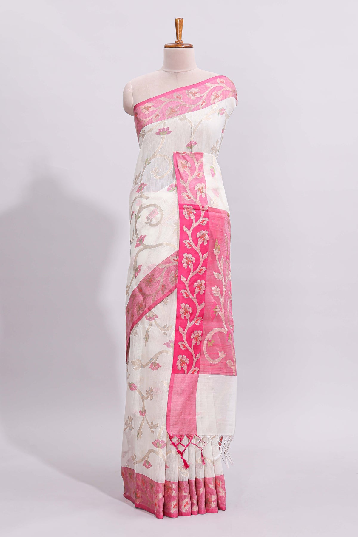 White floral design art tussar saree with contrast border and zari blouse