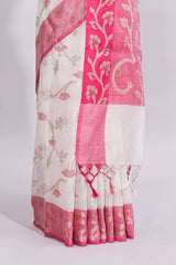 White floral design art tussar saree with contrast border and zari blouse