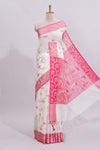 White floral design art tussar saree with contrast border and zari blouse