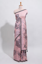 Blush pink with charcoal grey floral print tussar saree with self sleek serrated border and matching blouse