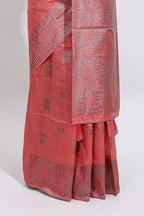 Coral rust geometric matrix tussar saree with self tangled branchesborder and pallu with matching blouse
