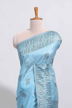 Light blue geometric matrix tussar saree with self tangled branchesborder and pallu with matching blouse