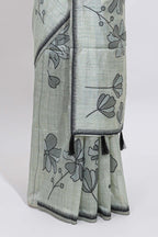 Sage green with charcoal grey floral print tussar saree with self sleek serrated border and matching blouse