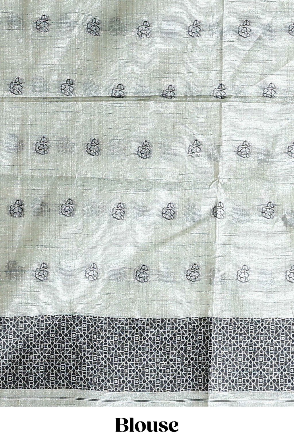 Sage green with charcoal grey floral print tussar saree with self sleek serrated border and matching blouse