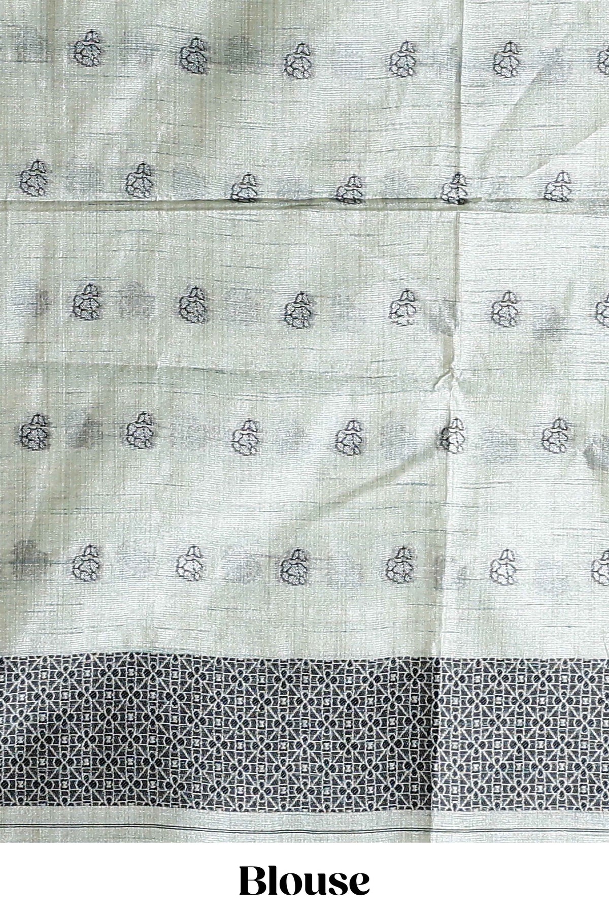 Sage green with charcoal grey floral print tussar saree with self sleek serrated border and matching blouse