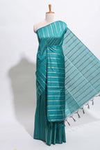 Borderless teal-peacock blue vertical zari striped and polka tussar saree with matching blouse