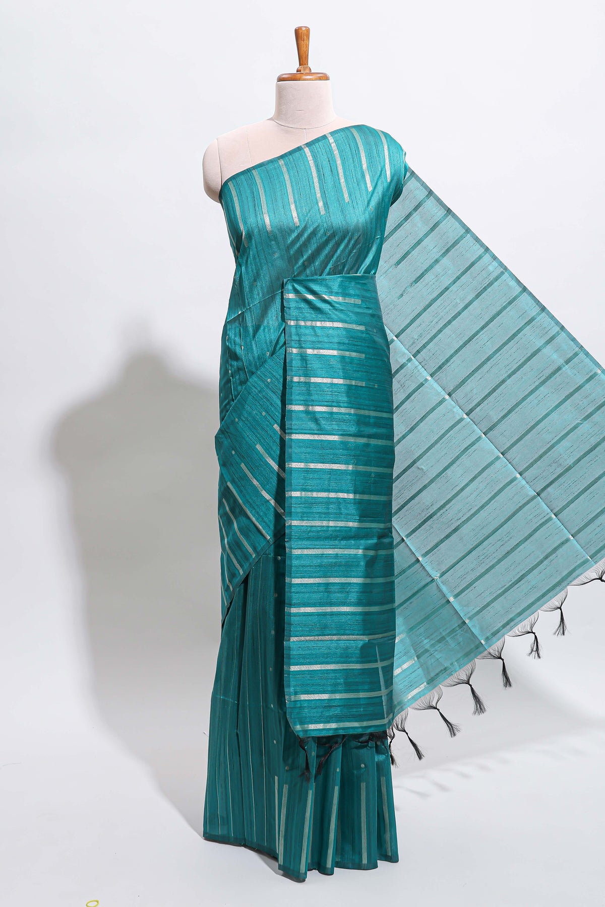 Borderless teal-peacock blue vertical zari striped and polka tussar saree with matching blouse