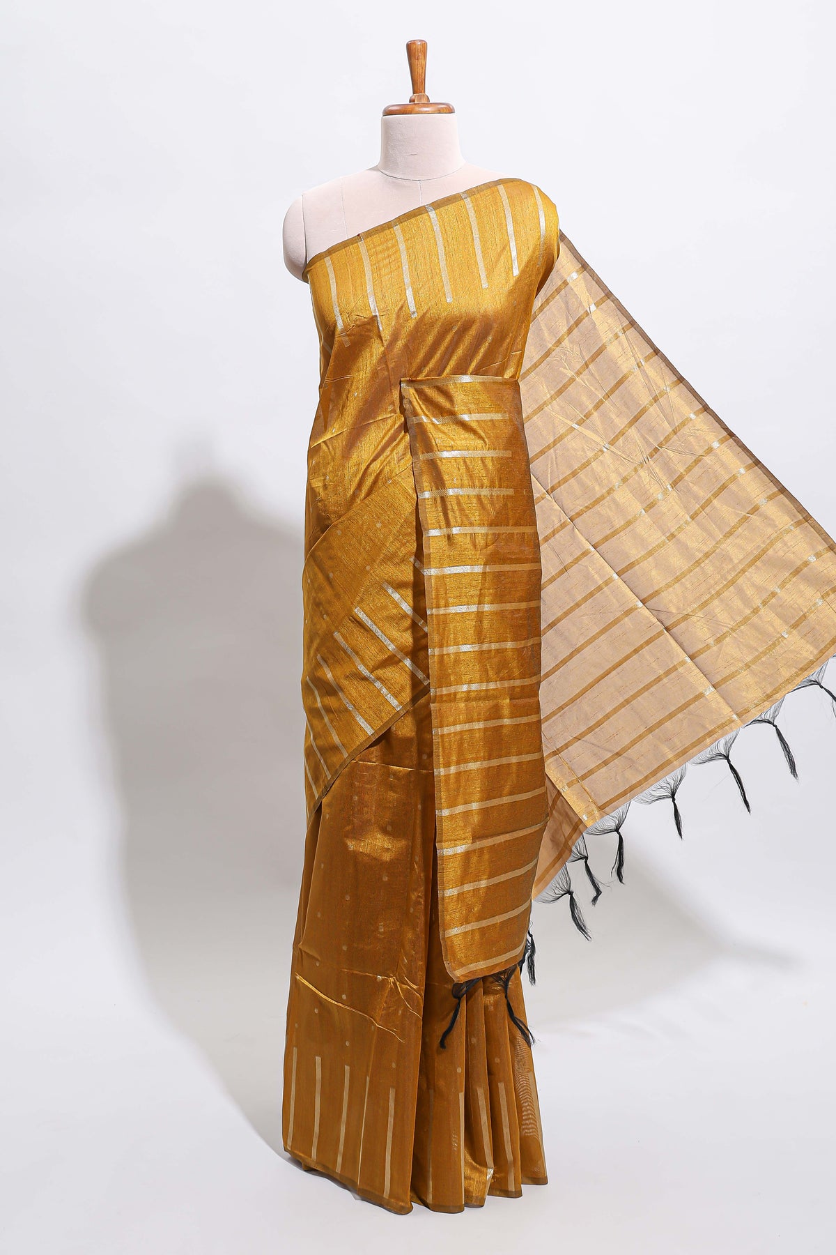 Borderless mustard gold vertical zari striped and polka tussar saree with matching blouse