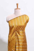 Borderless mustard gold vertical zari striped and polka tussar saree with matching blouse