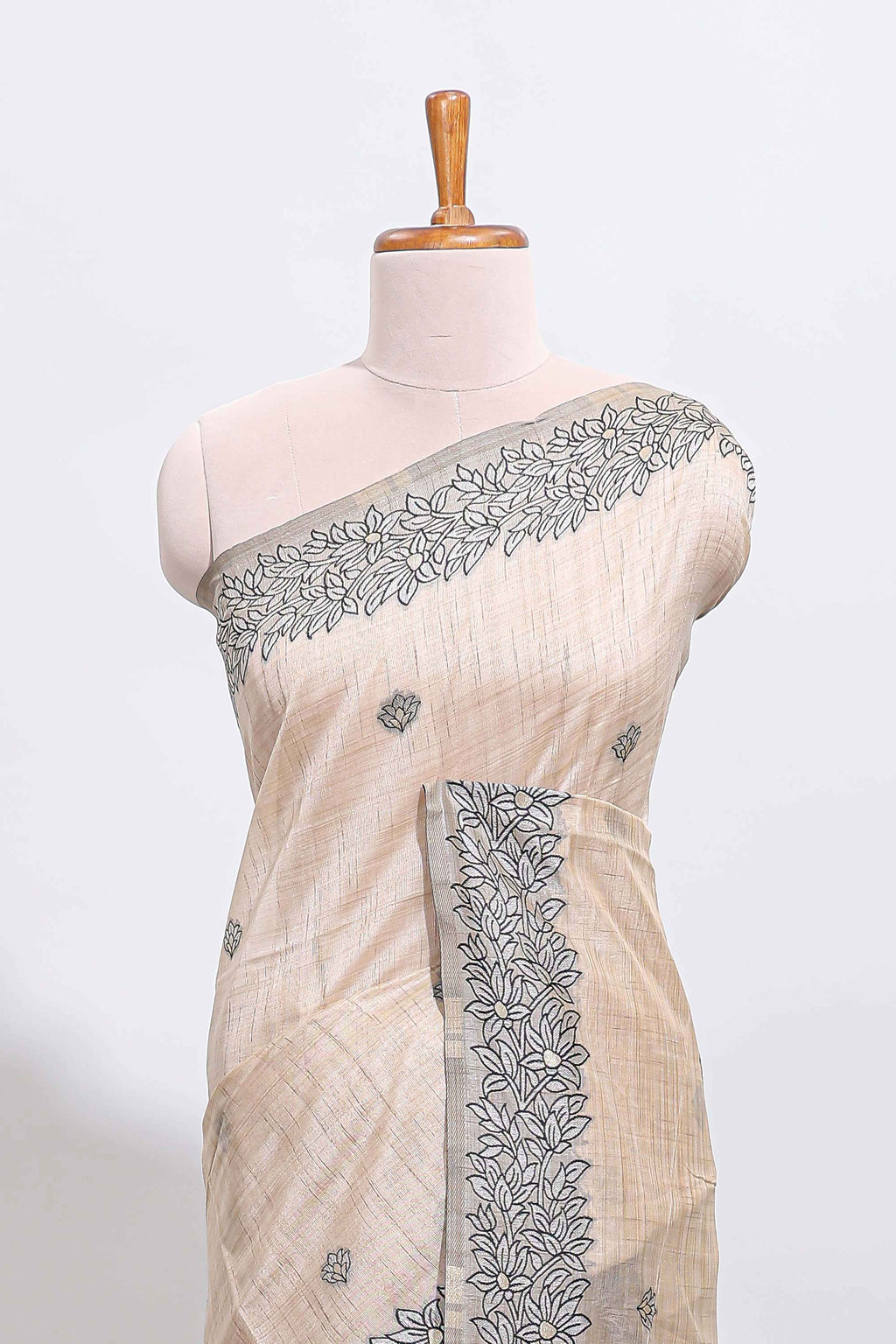 Off white floral motifs tussar saree with self floral designed border and matching blouse