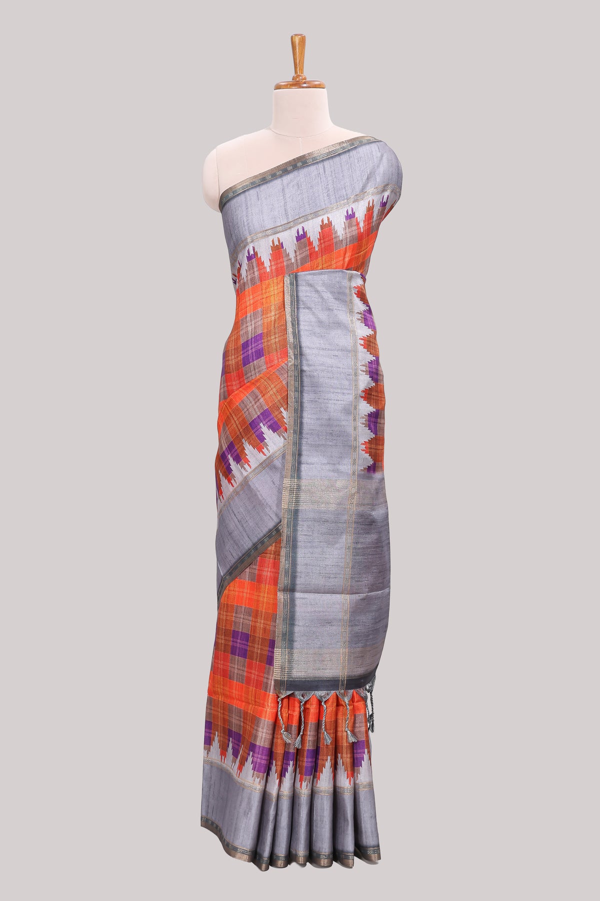 Multicolor checked tussar saree with contrast border and pallu that comes with matching blouse