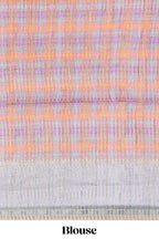 Multicolor checked tussar saree with contrast border and pallu that comes with matching blouse