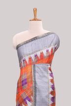 Multicolor checked tussar saree with contrast border and pallu that comes with matching blouse