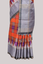 Multicolor checked tussar saree with contrast border and pallu that comes with matching blouse