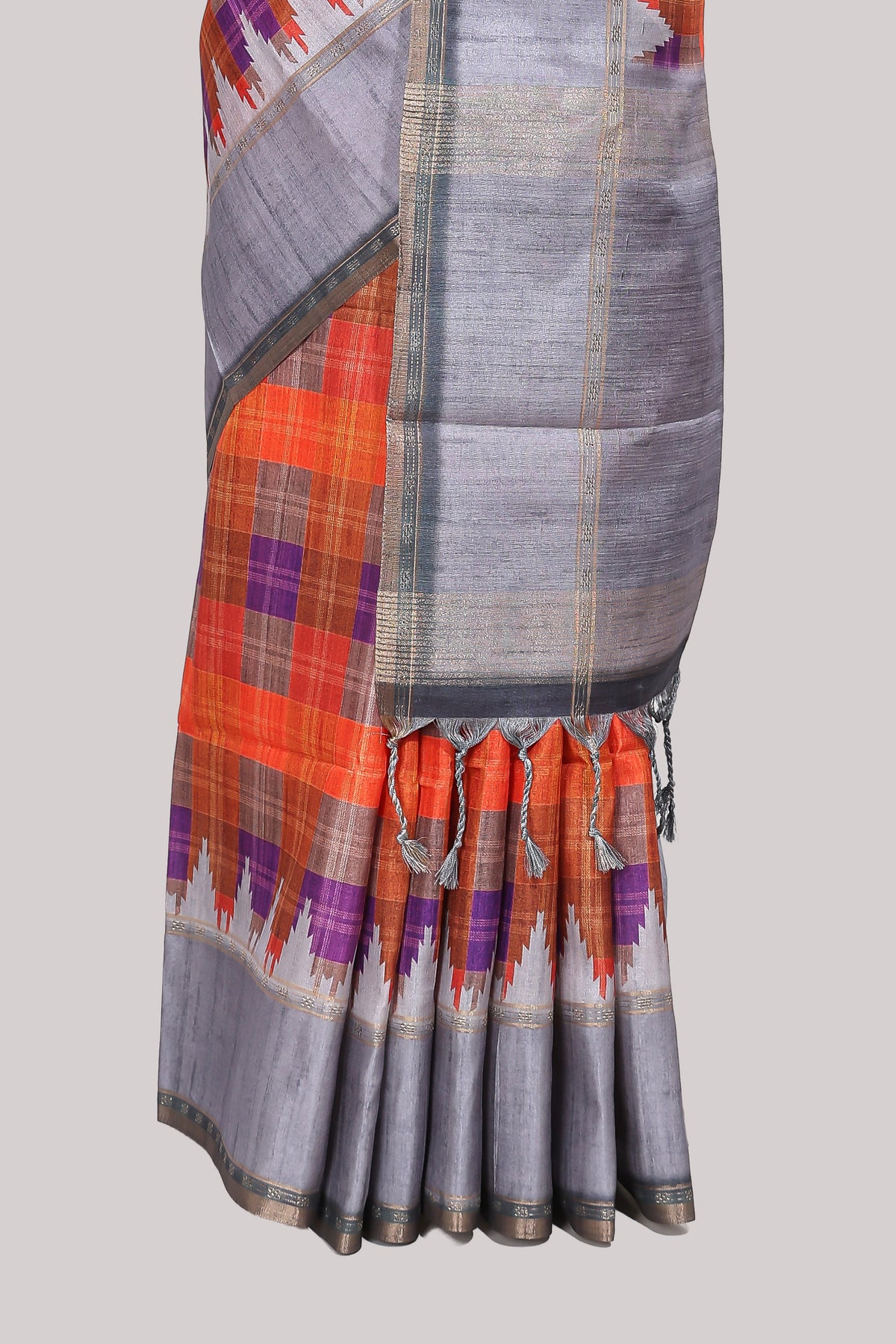 Multicolor checked tussar saree with contrast border and pallu that comes with matching blouse
