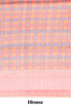 Multicolor checked tussar saree with peach contrast border and pallu that comes with matching blouse