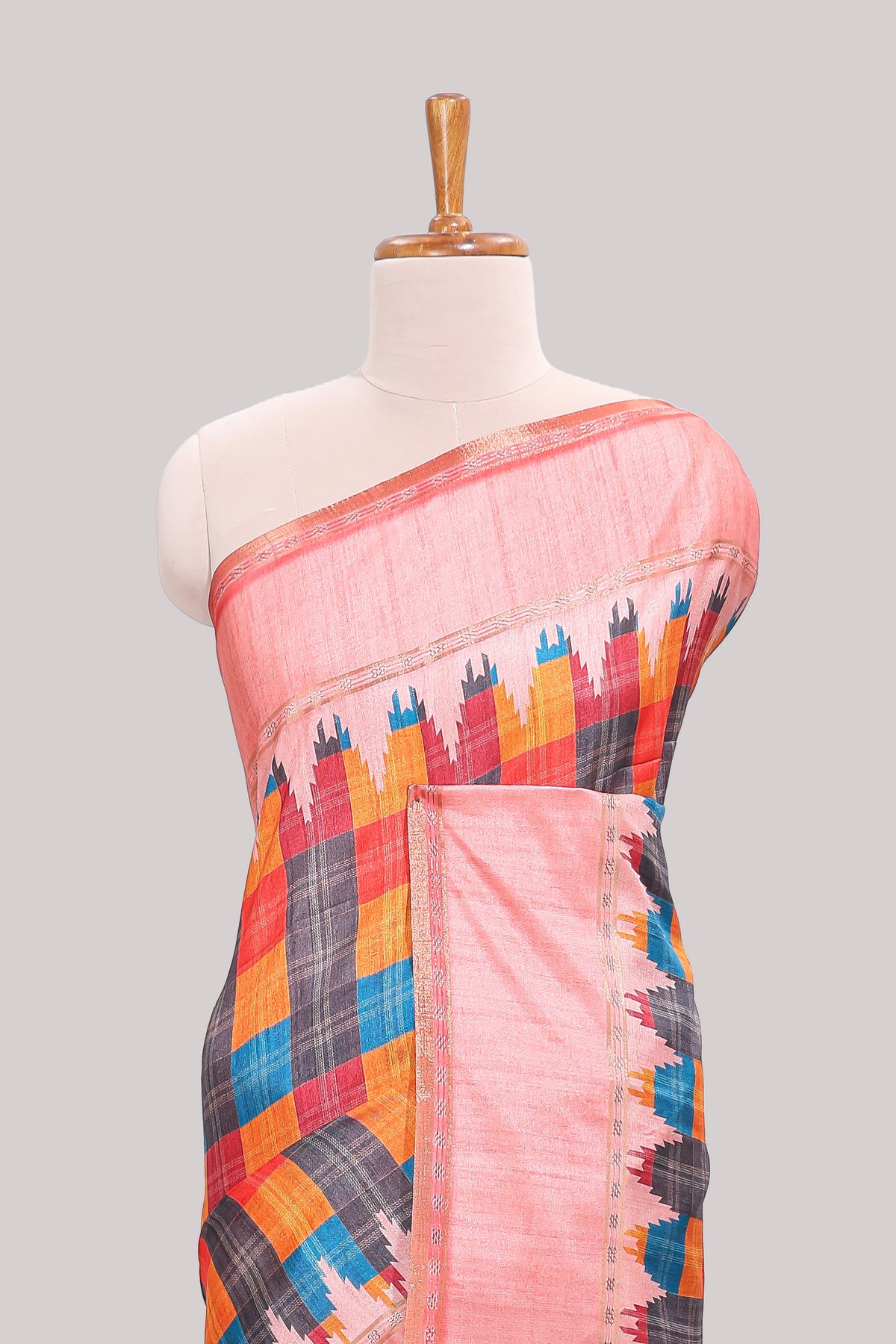 Multicolor checked tussar saree with peach contrast border and pallu that comes with matching blouse
