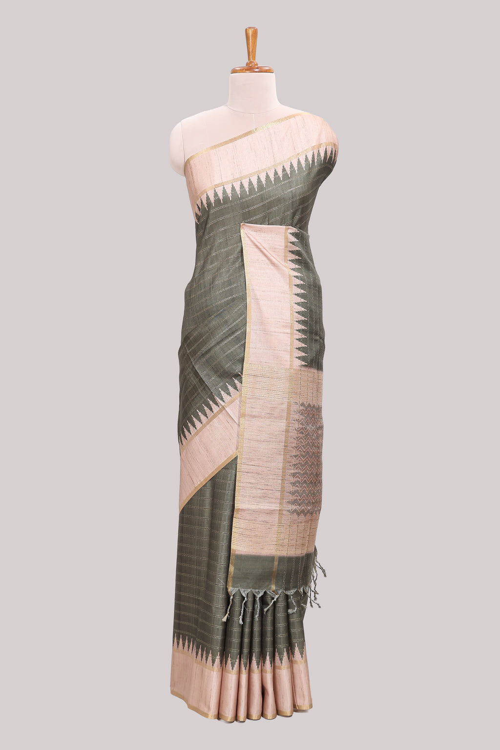 Moss green striped tussar saree with contrast border and pallu that comes with blouse
