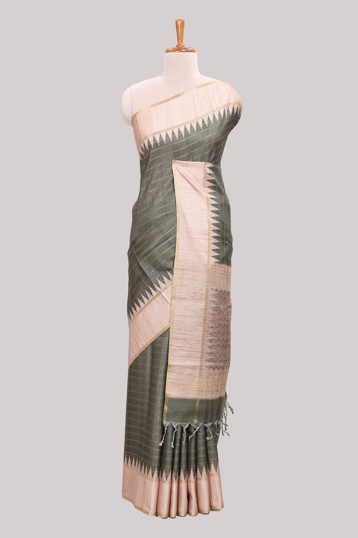 Moss green striped tussar saree with contrast border and pallu that comes with blouse