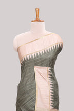 Moss green striped tussar saree with contrast border and pallu that comes with blouse