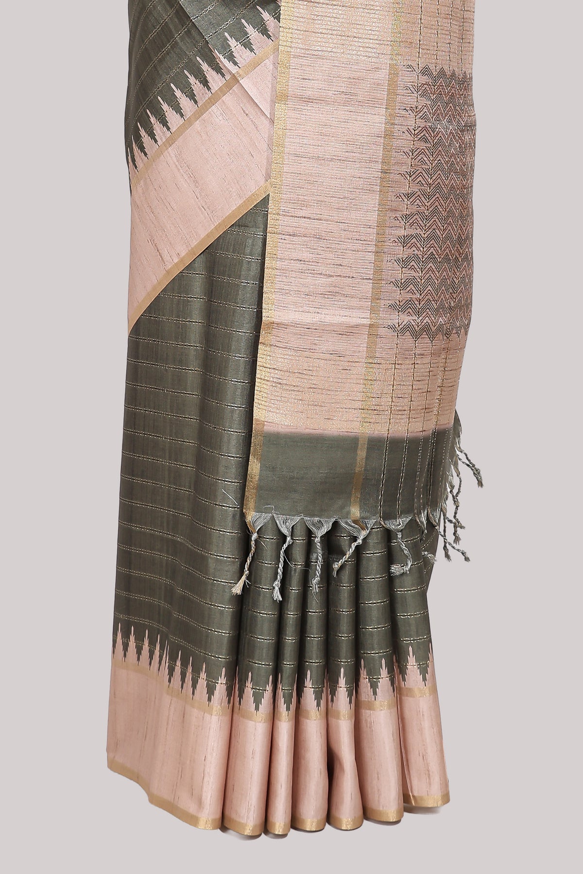 Moss green striped tussar saree with contrast border and pallu that comes with blouse