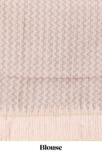Brown striped tussar saree with contrast border and pallu that comes with blouse