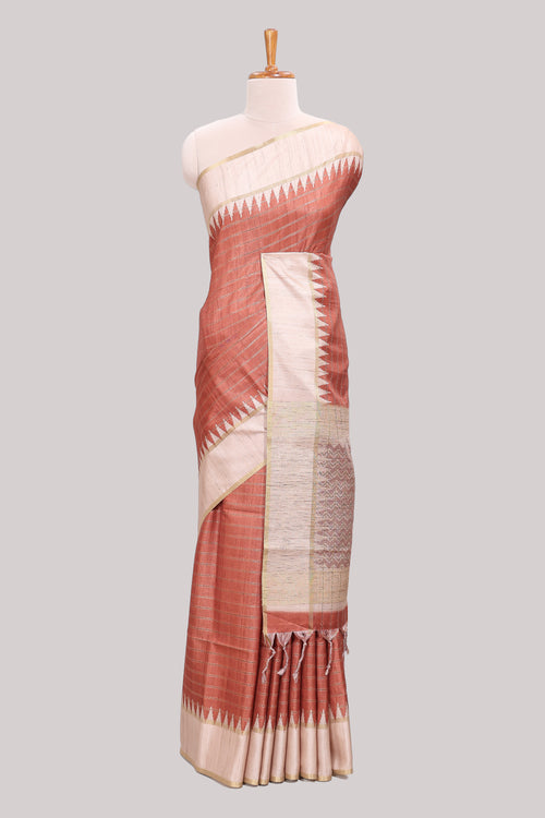 Rust striped tussar saree with contrast border and pallu that comes with blouse