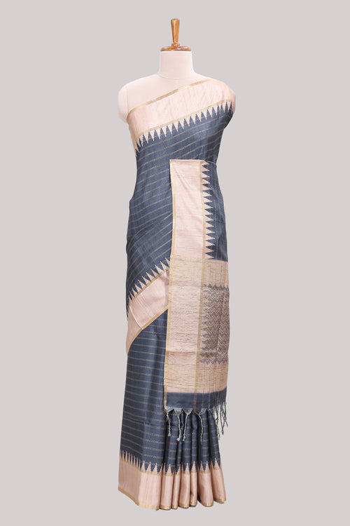 Grey striped tussar saree with contrast border and pallu that comes with blouse