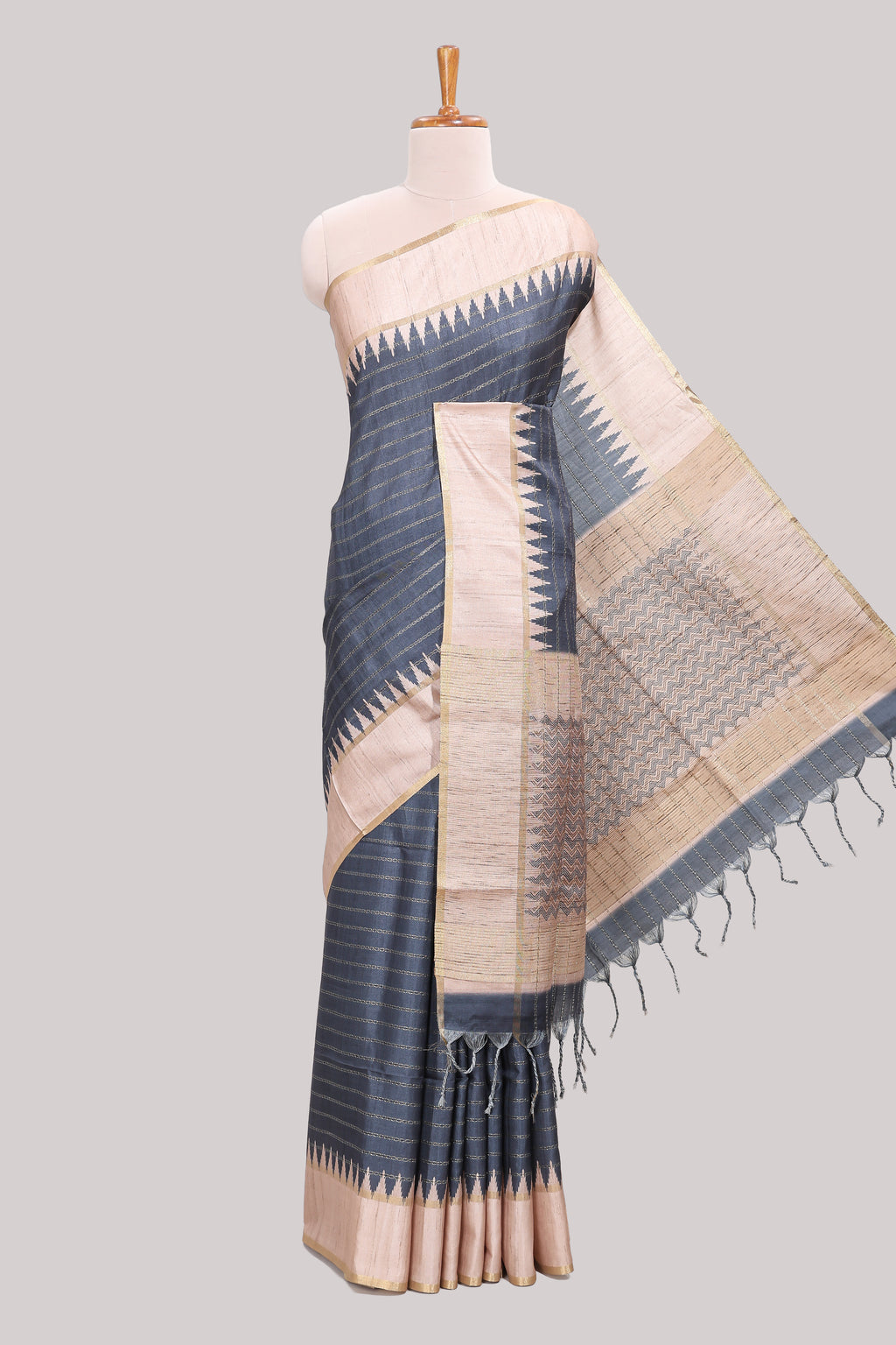 Grey striped tussar saree with contrast border and pallu that comes with blouse