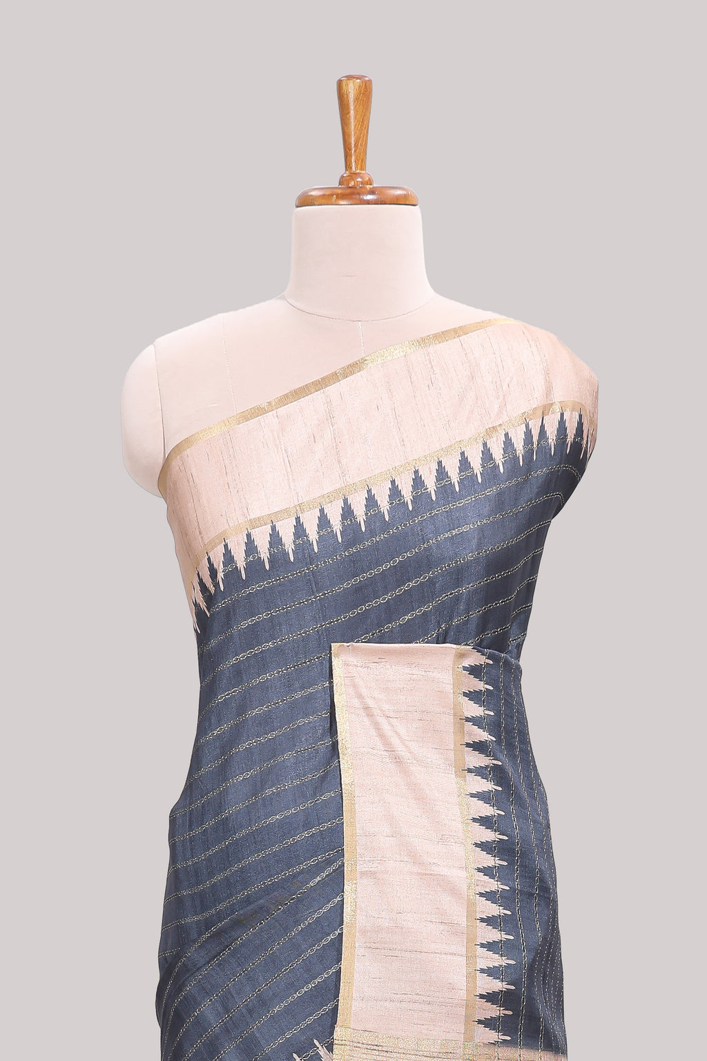 Grey striped tussar saree with contrast border and pallu that comes with blouse