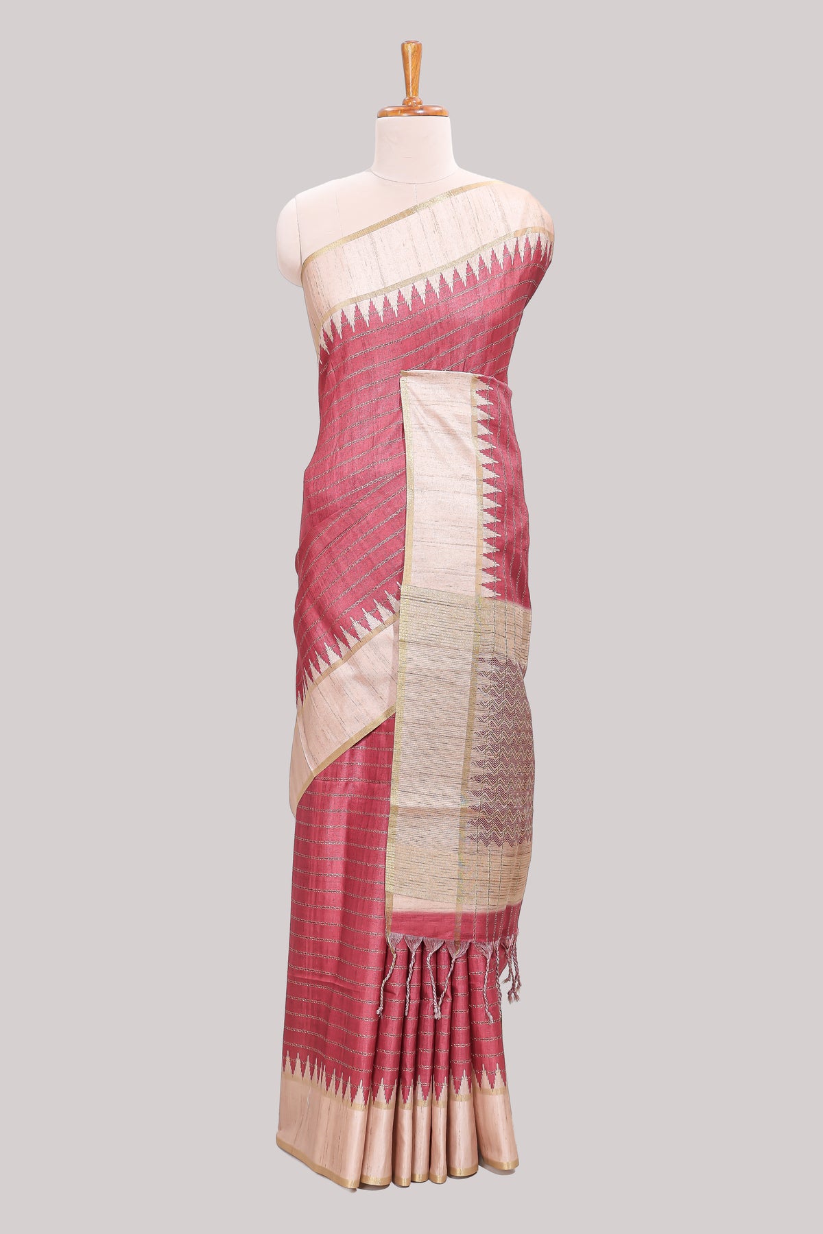 Rose pink striped tussar saree with contrast border and pallu that comes with blouse