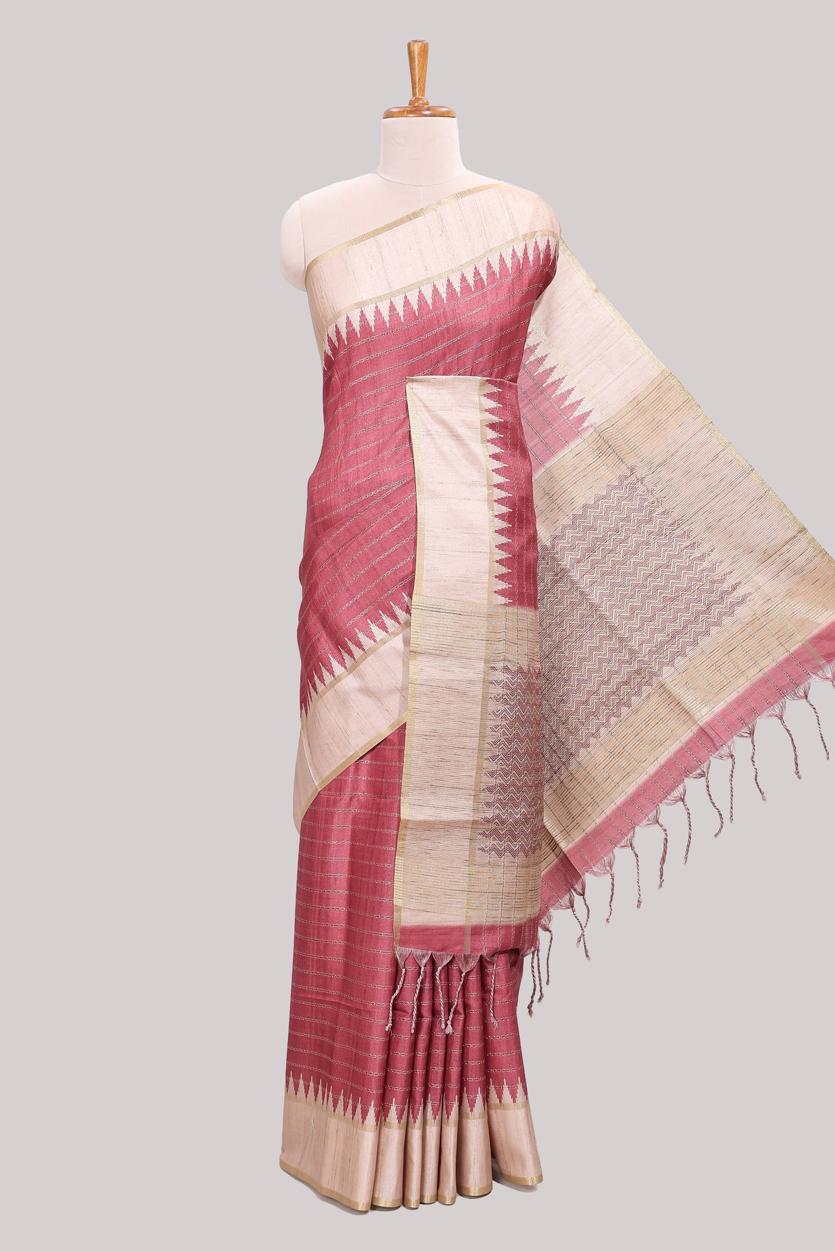Rose pink striped tussar saree with contrast border and pallu that comes with blouse