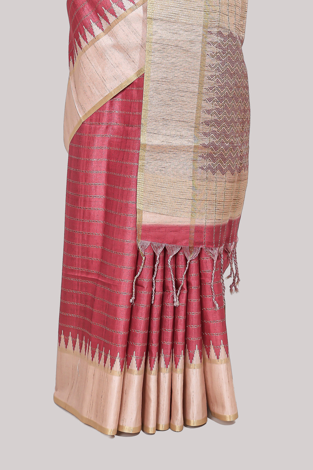 Rose pink striped tussar saree with contrast border and pallu that comes with blouse