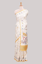 Off white checked tussar saree with contrast border and pallu that comes with matching floral blouse