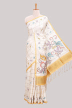 Off white checked tussar saree with contrast border and pallu that comes with matching floral blouse