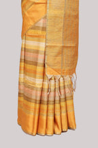 Yellow striped tussar saree with self border and pallu that comes with matching blouse