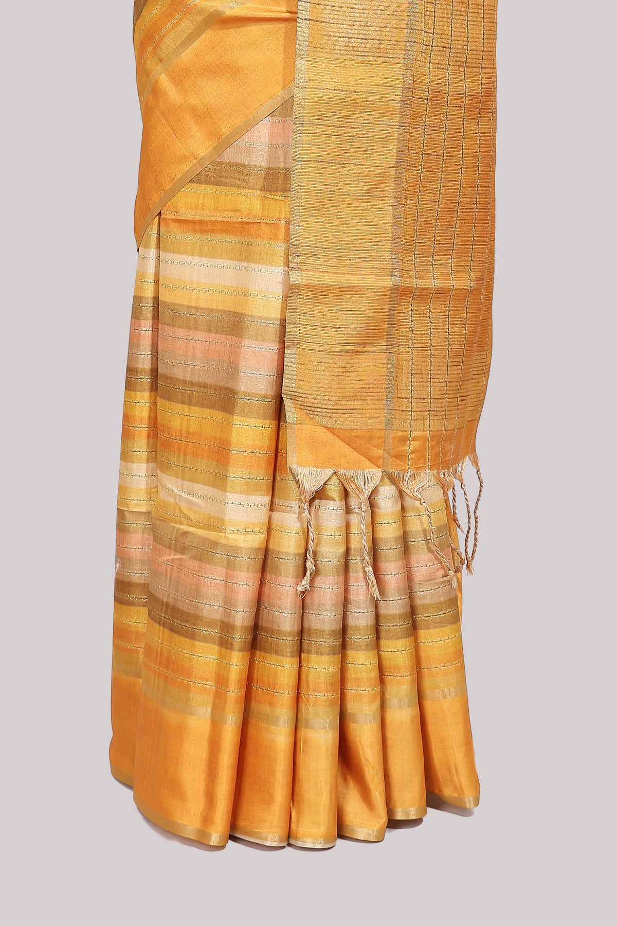 Yellow striped tussar saree with self border and pallu that comes with matching blouse