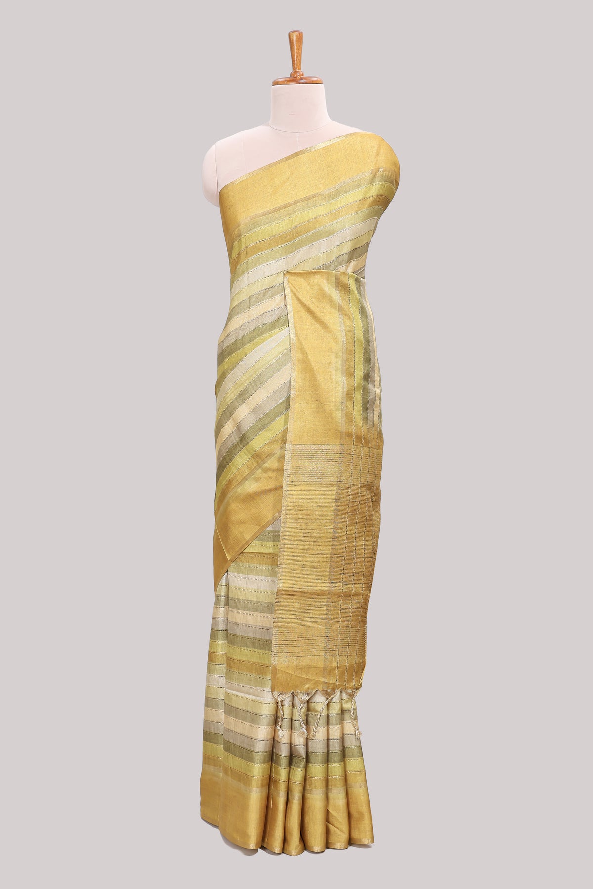 Lime yellow striped tussar saree with self border and pallu that comes with matching blouse