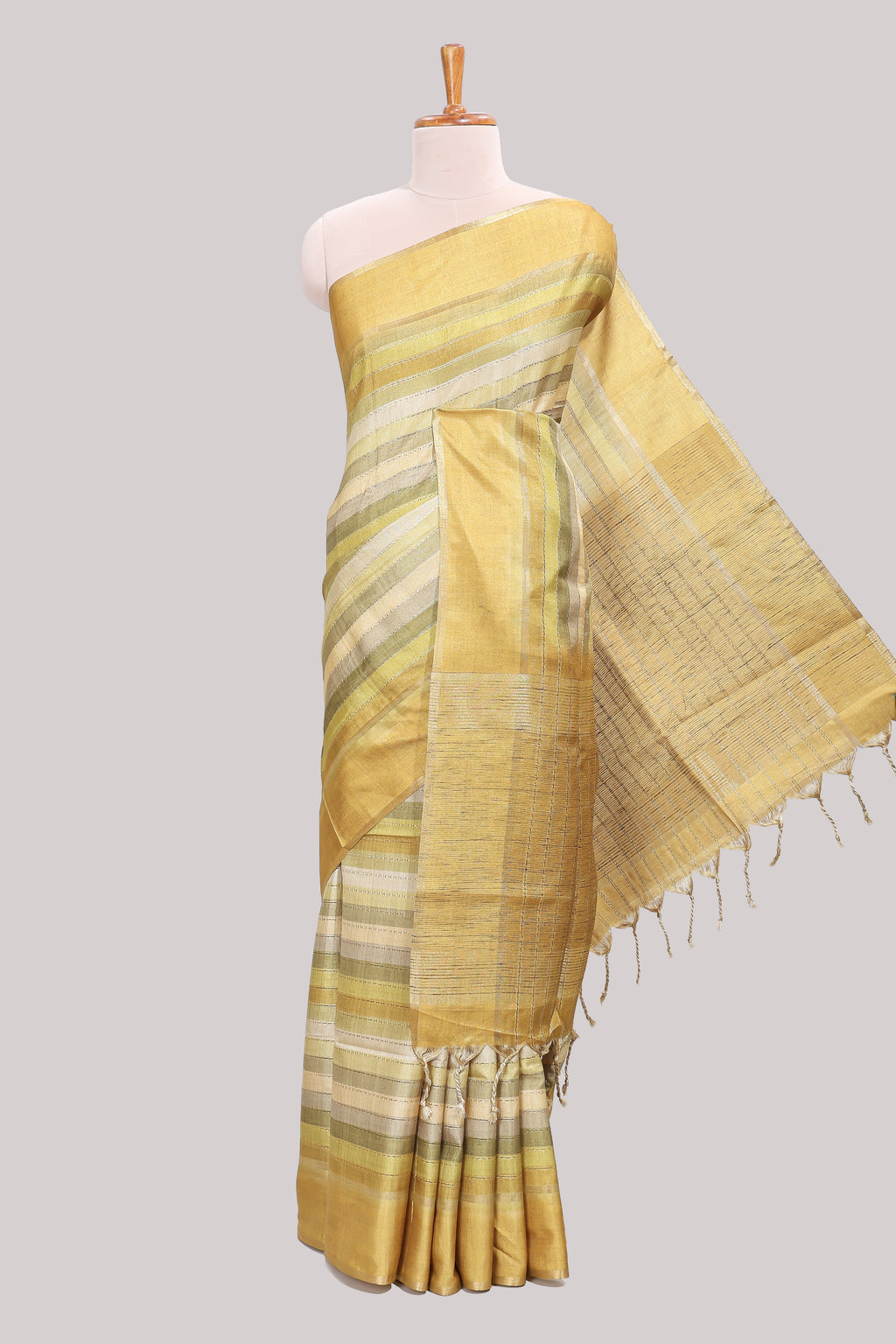 Lime yellow striped tussar saree with self border and pallu that comes with matching blouse