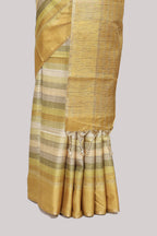 Lime yellow striped tussar saree with self border and pallu that comes with matching blouse